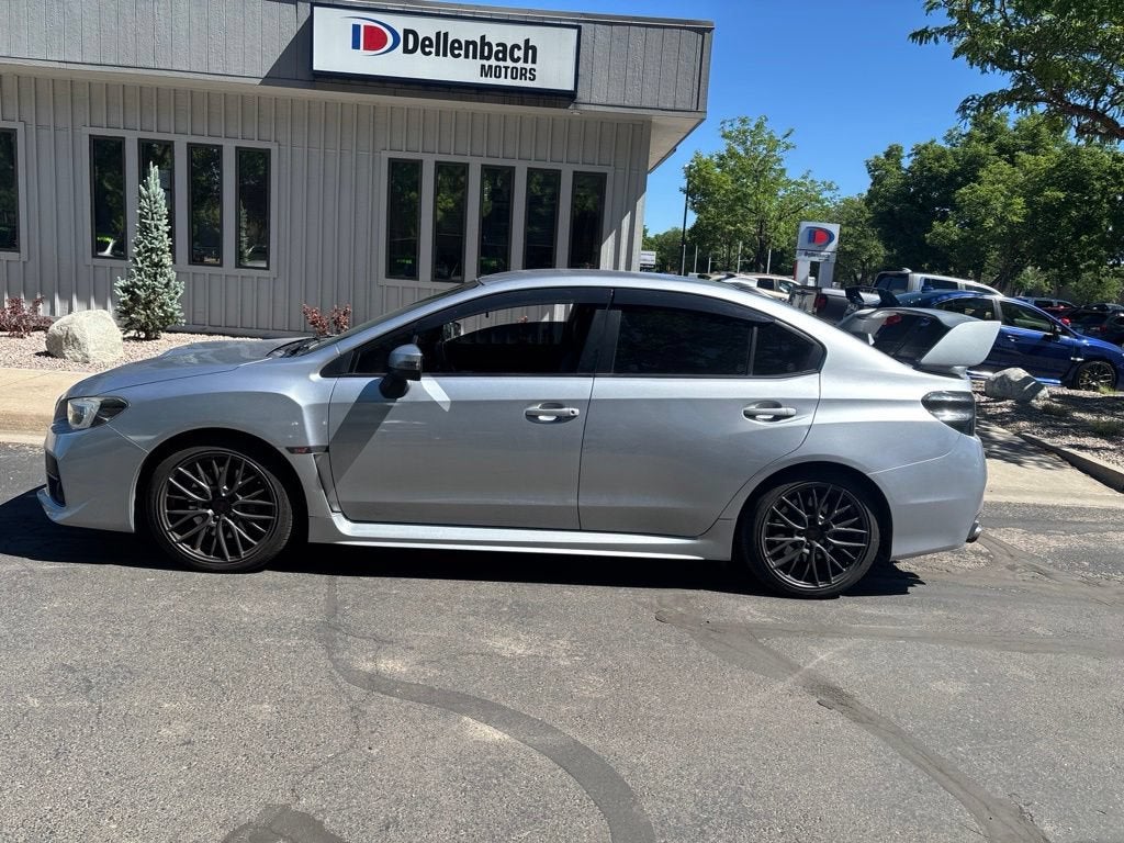 2015 Subaru WRX STI Base in Ice Silver Metall — front three-quarter view