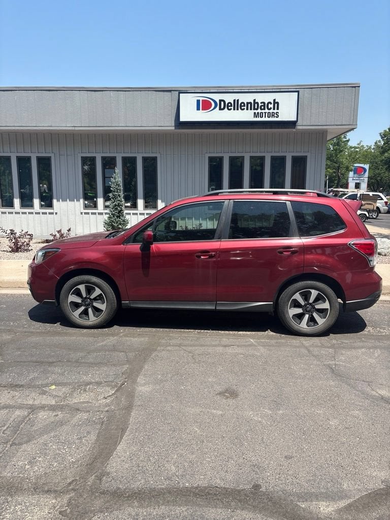 2018 Subaru Forester Premium in Venetian Red Pear — front three-quarter view