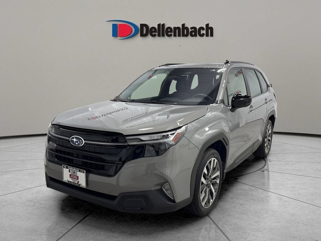 2025 Subaru Forester Touring in River Rock Pearl — front three-quarter view